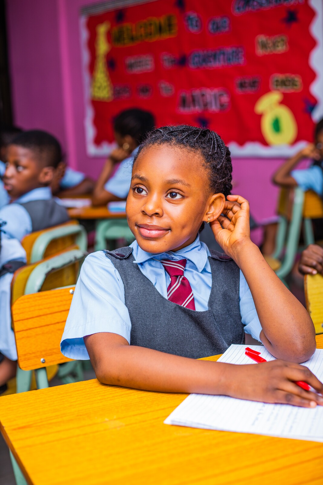 A Lower Prep pupil smiling in class