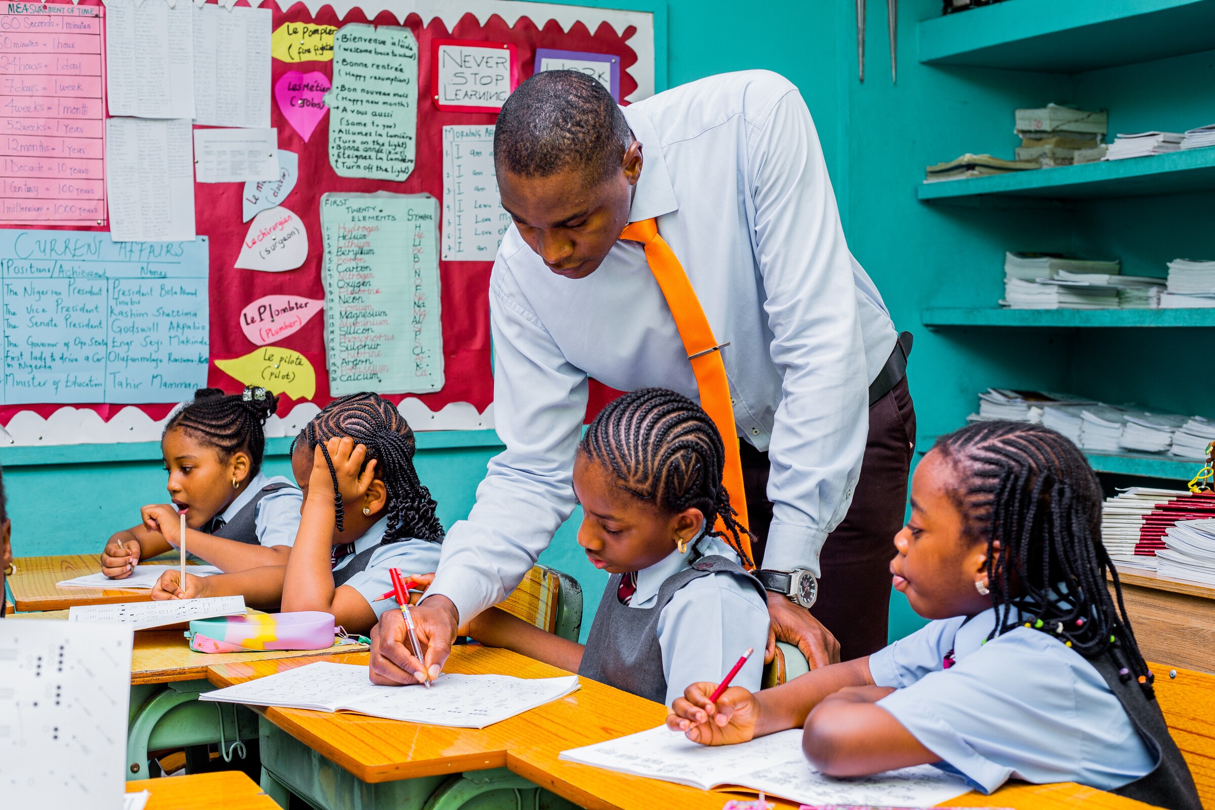 A Lower Prep teacher guiding pupils in class
