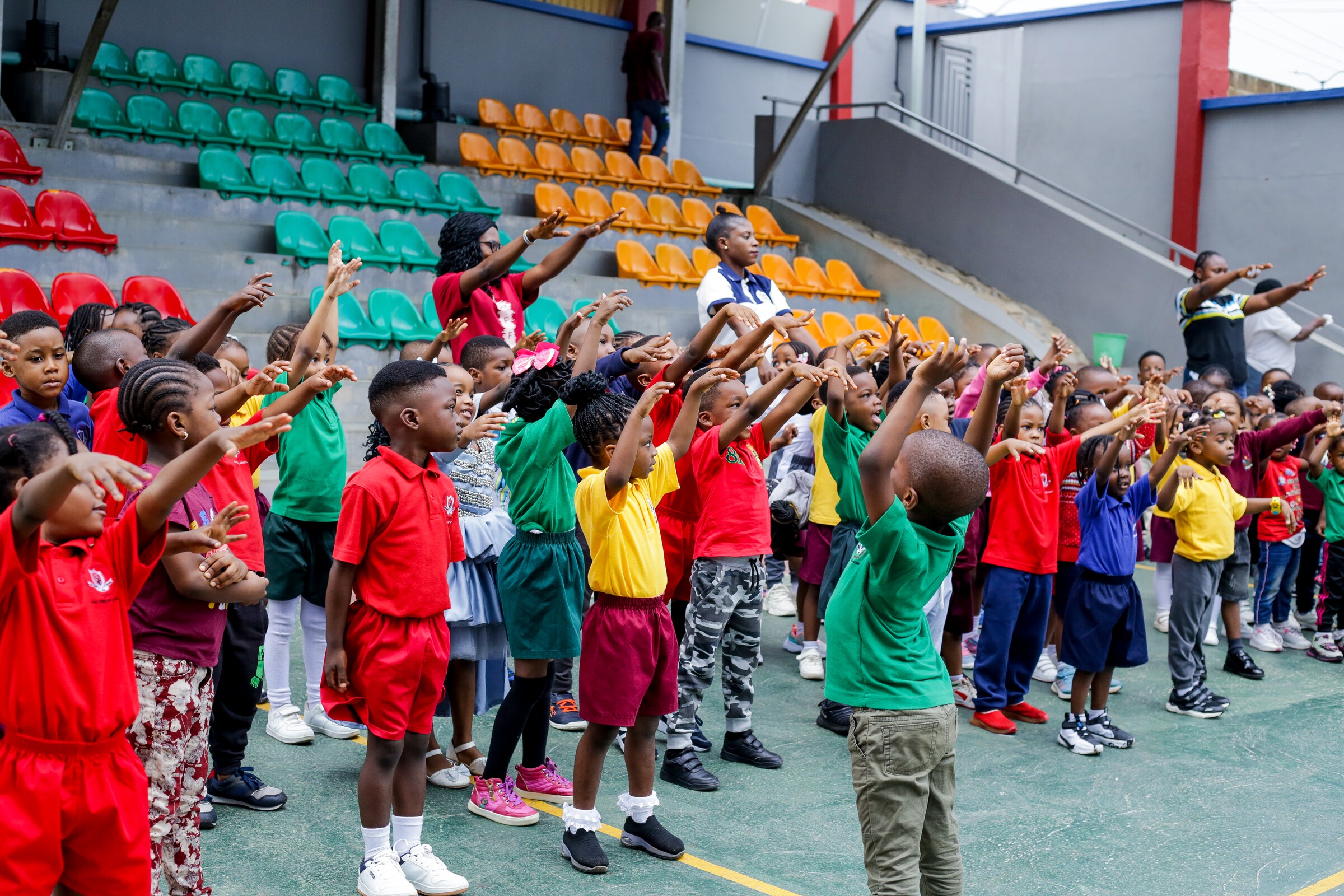 Concord pupils warming up together during a sports event