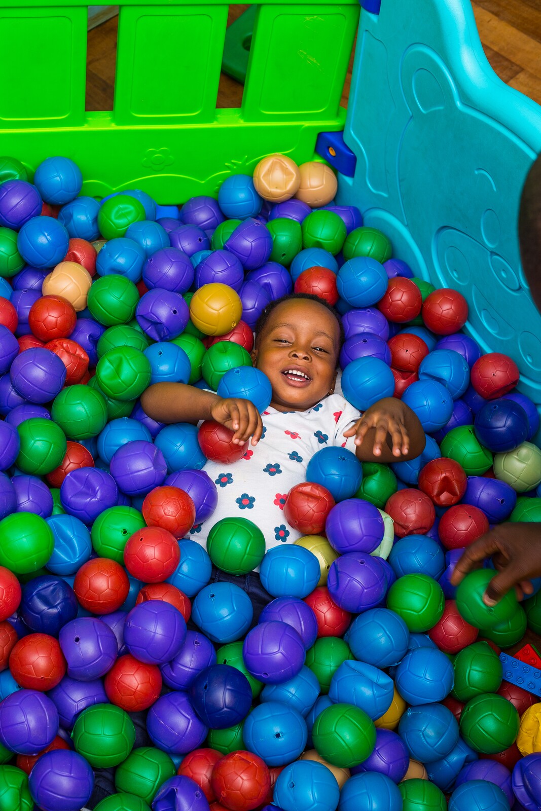 A young pupil enjoying the ball pit