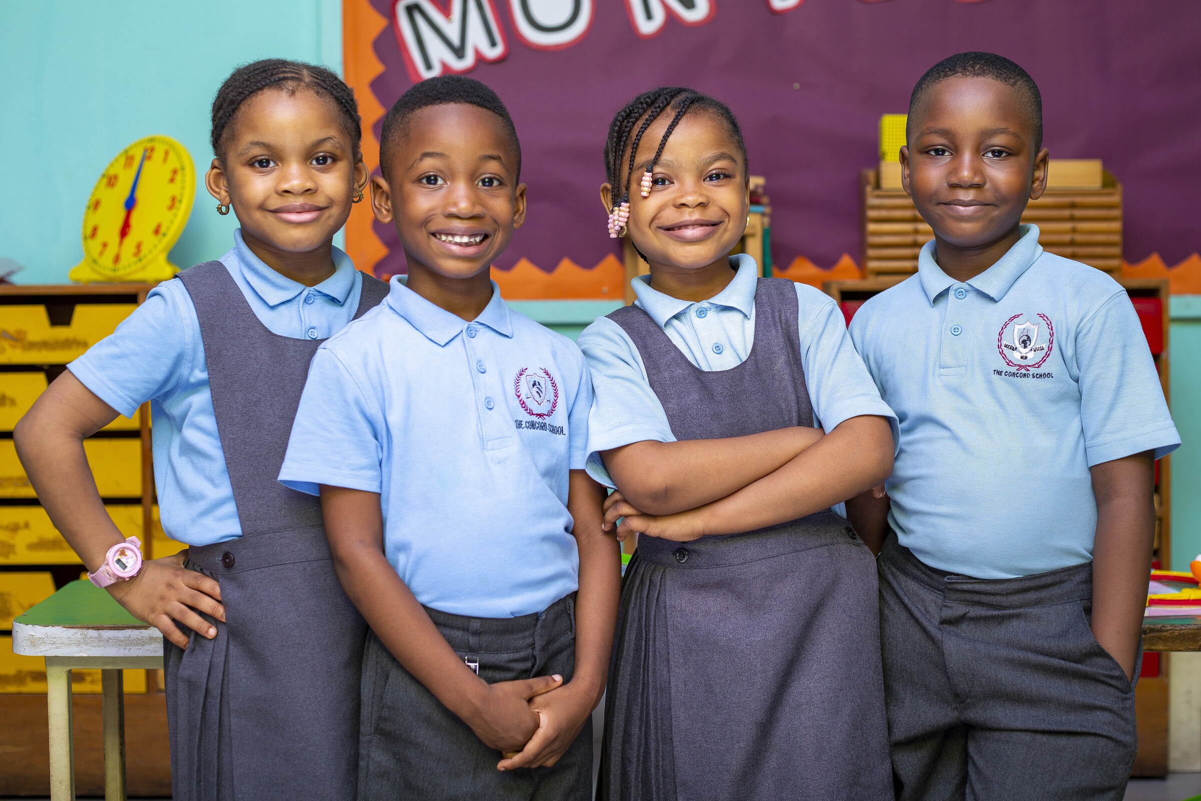 A group of happy Early Years pupils