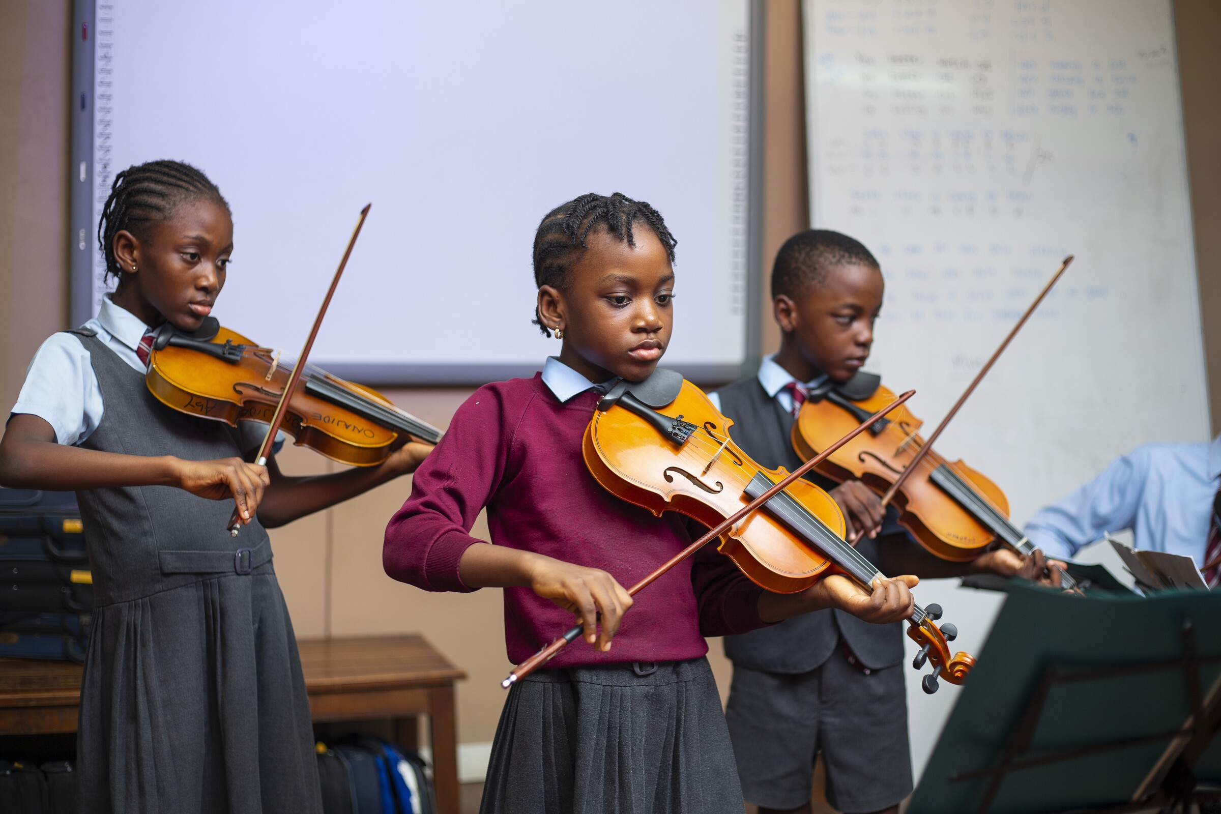 Concord pupils playing violins