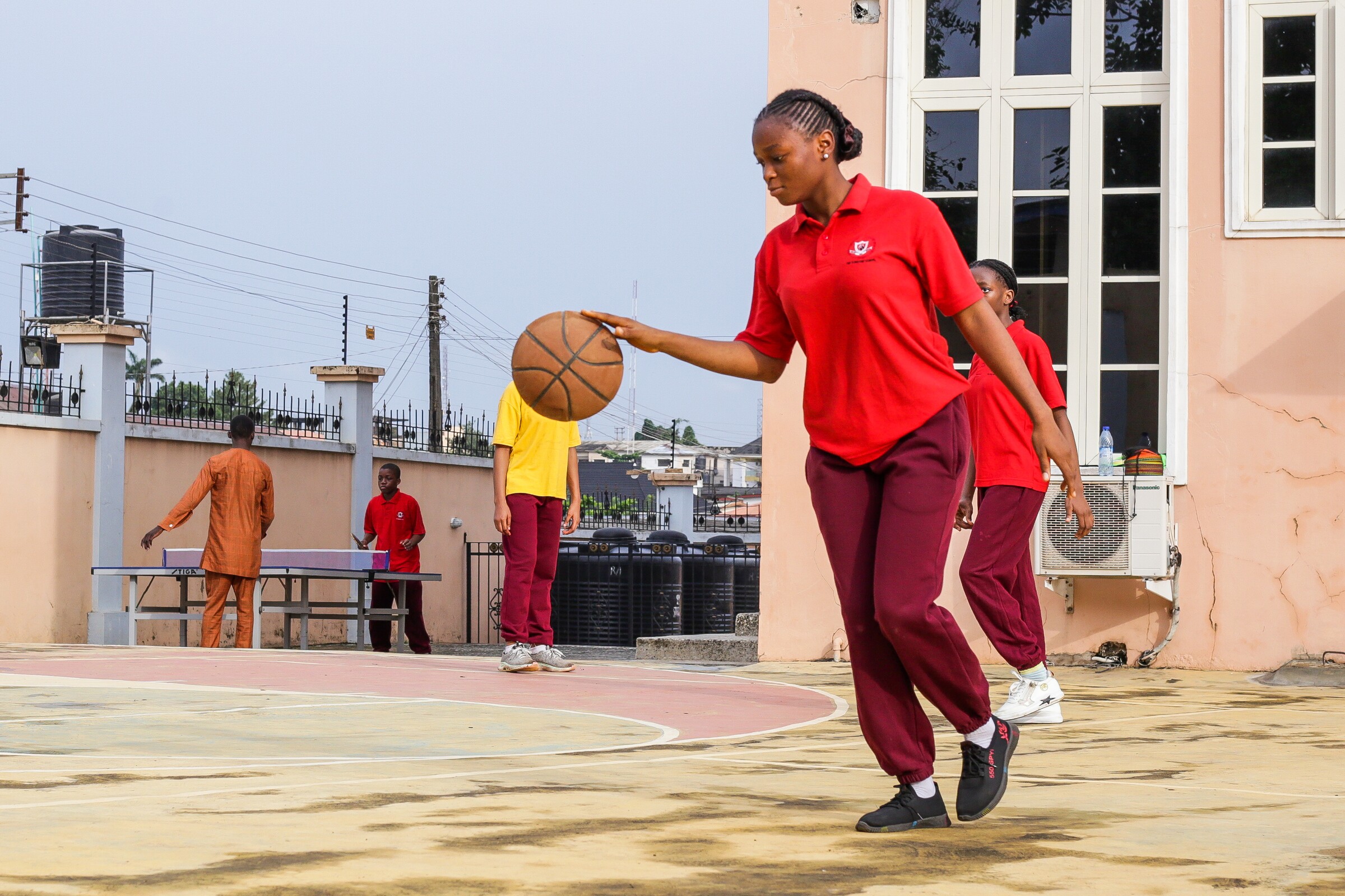 A Concord High School student playing basketball